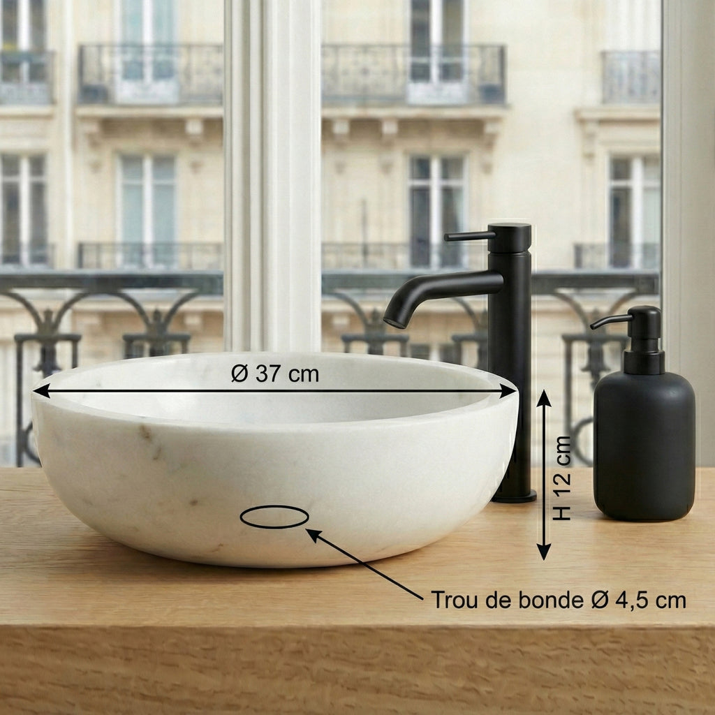 Petit lavabo de salle de bain en marbre blanc