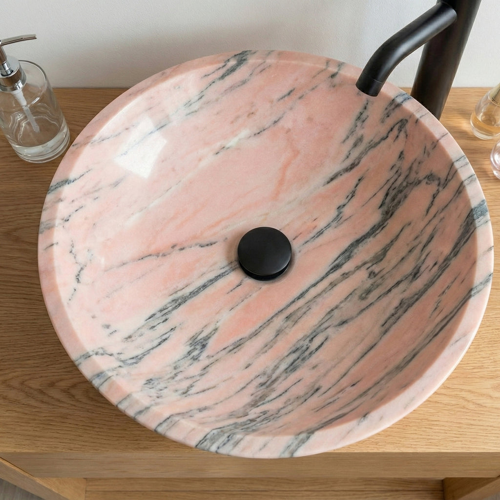 Petit lavabo de salle de bain en marbre rose