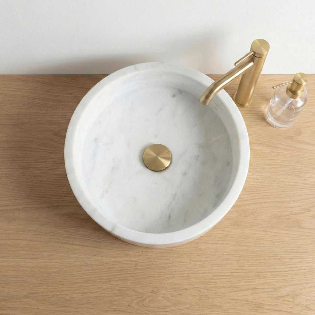 Grand lavabo de salle de bain rond en marbre blanc