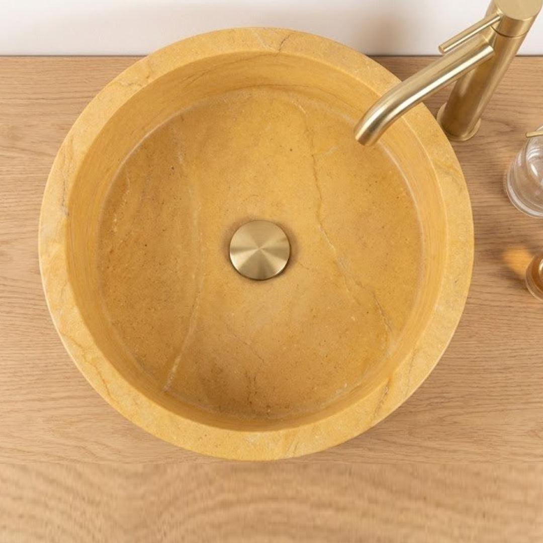 Grand lavabo de salle de bain rond en marbre jaune