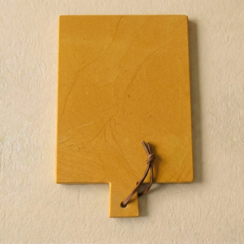 Planche de service en marbre jaune